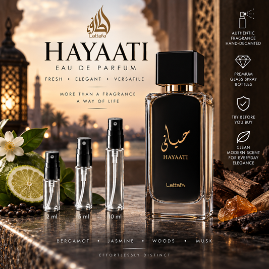 Lattafa Hayaati Eau de Parfum decant samples in 2 ml, 5 ml and 10 ml glass spray bottles beside the full-size retail bottle